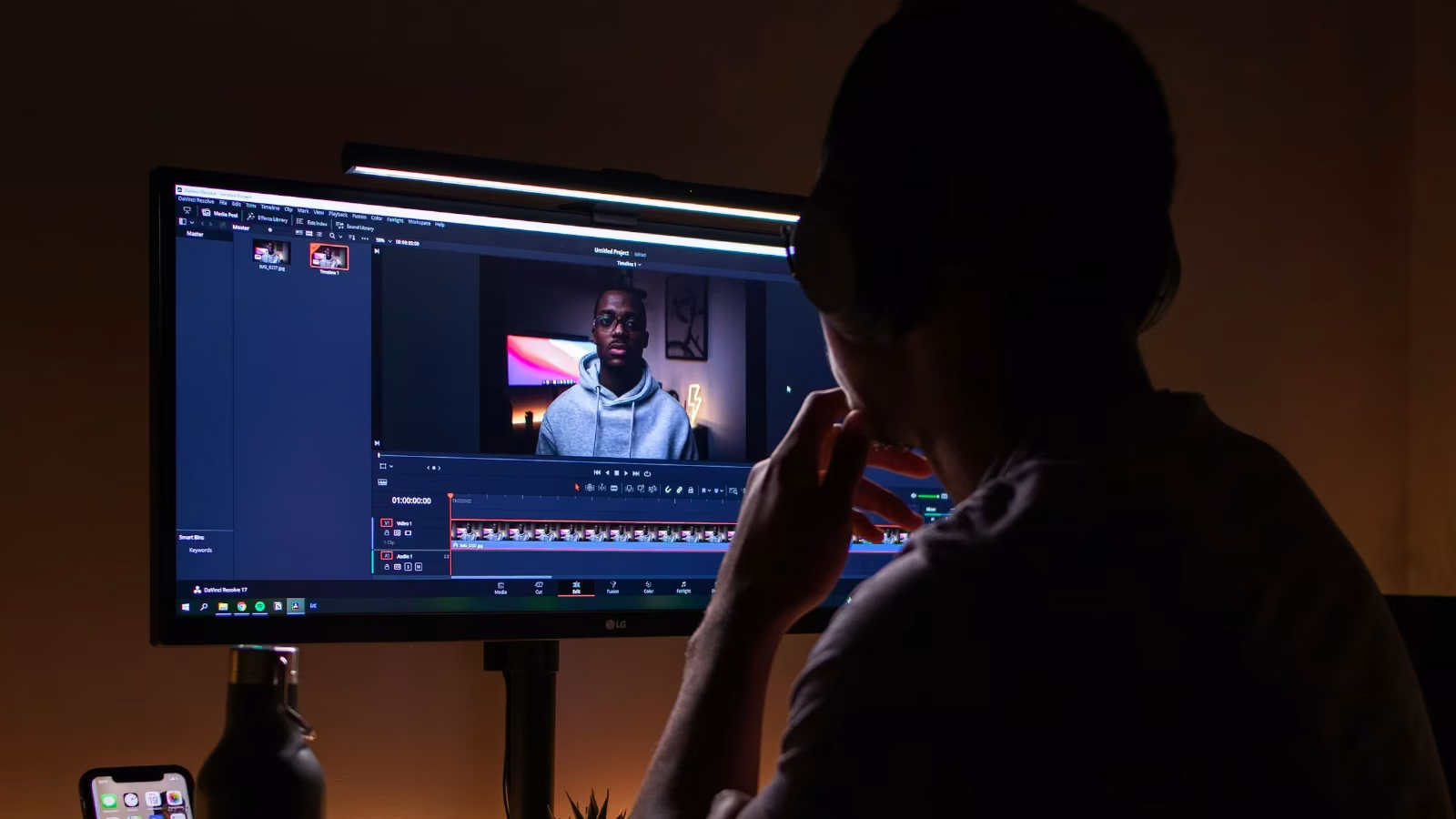 Video localization specialist performing quality assurance on multilingual subtitles in DaVinci Resolve editing suite